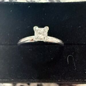 Elegant Silver Solitaire Ring with Square-Cut Clear Stone